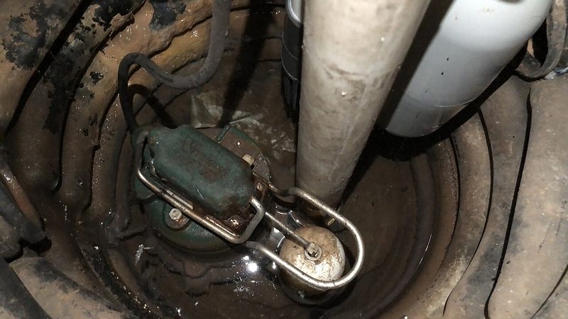 Basement sump pump pit, the equipment used to stop water coming up through a floor from groundwater